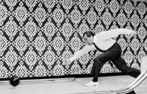 Richard M. Nixon using the White House bowling alley