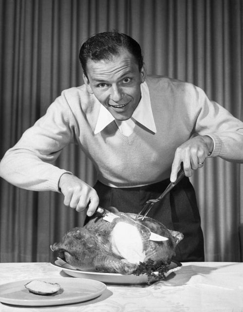 Frank Sinatra carving a turkey