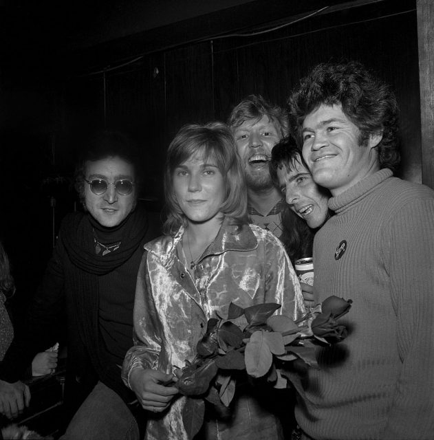 Drinking buddies known as ‘The Hollywood Vampires’ (L-R — John Lennon (during his ‘Lost Weekend’ period), Harry Nilsson, Alice Cooper and Micky Dolenz celebrate an early Thanksgiving with singer Anne Murray (2nd from left) at the Troubadour on November 21, 1973 in Los Angeles, California. (Photo Credit: Richard Creamer/Michael Ochs Archives/Getty Images)