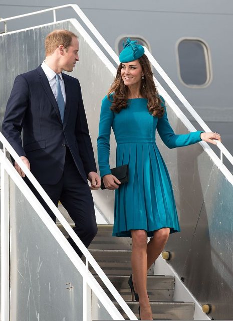 Britain’s Prince William with Catherine the Duchess of Cambridge walk from the plane after arriving in Dunedin airport in Dunedin on April 13, 2014.  (Photo Credit: Marty Melville/AFP via Getty Images)