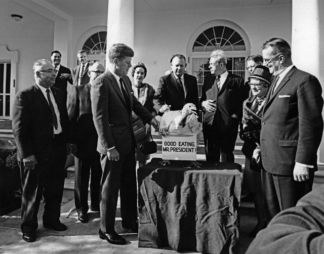 US president John Kennedy, at the pardoning of the turkey (Thanksgiving) ceremony, at the White House. (Photo Credit: Universal History Archive/Universal Images Group via Getty Images)