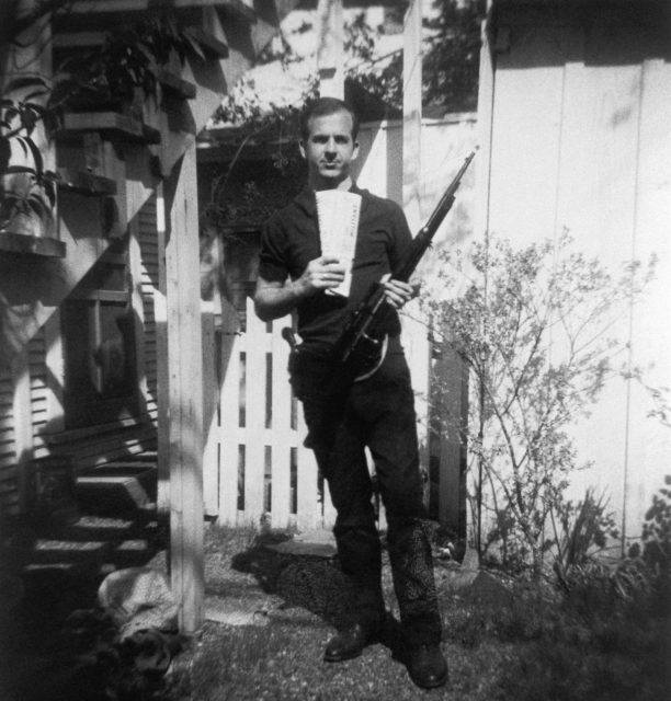 Lee Harvey Oswald with rifle 