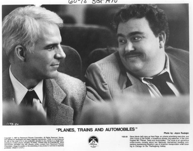 Planes, Trains & Automobiles lobby card (Photo Credit: Paramount Pictures & MovieStillsDB)