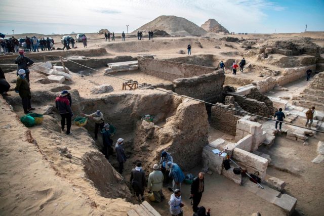 Archaeologists conducting an excavation at Saqqara