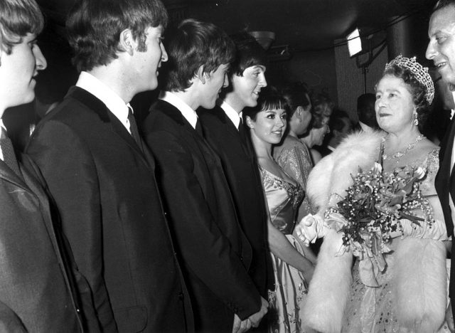 The Beatles speaking with Queen Elizabeth the Queen Mother