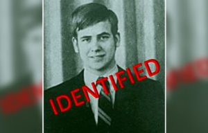 Portrait of Theodore J. Conrad with "IDENTIFIED" written in red over it