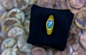 A ring with a blue stone that was discovered with the wreck