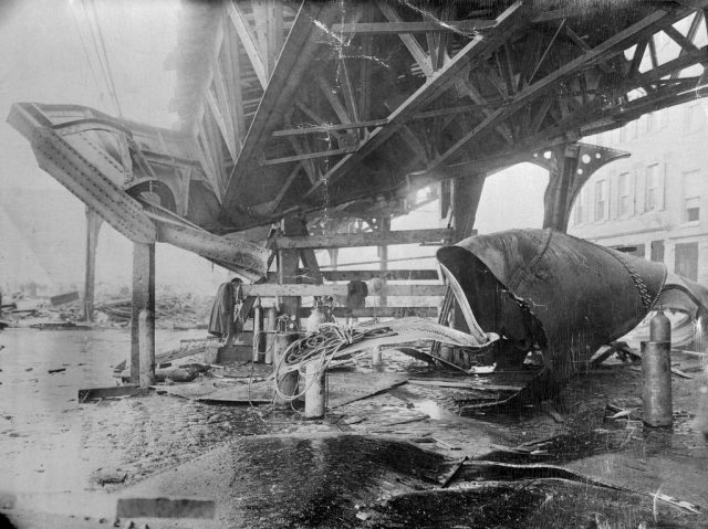 Elevated train structure damaged by shrapnel 
