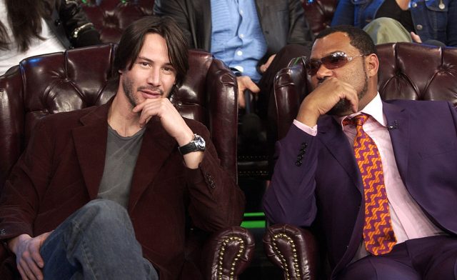 Keanu Reeves and Laurence Fishburne during The Cast of “The Matrix Reloaded” and P.O.D. Visit MTV’s “TRL” (Photo Credit: KMazur/WireImage)