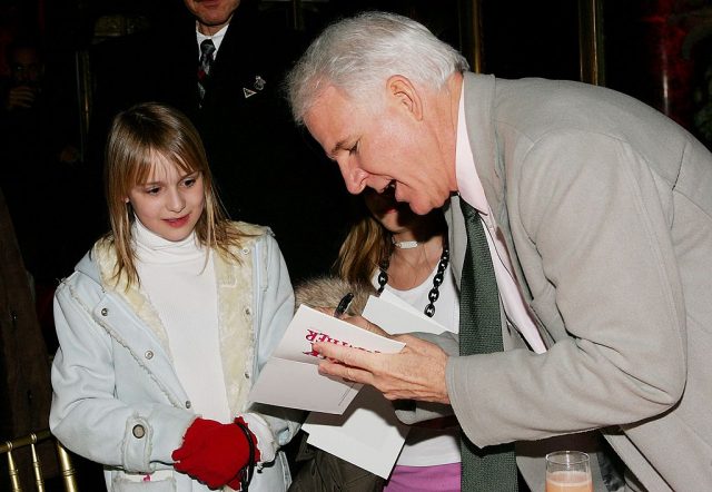 Steve Martin signs autographs