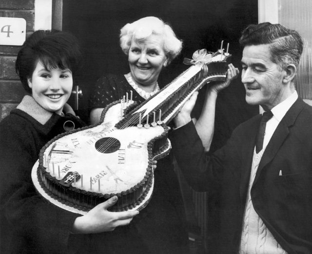George's parents Harold and Louise Harrison with another fan