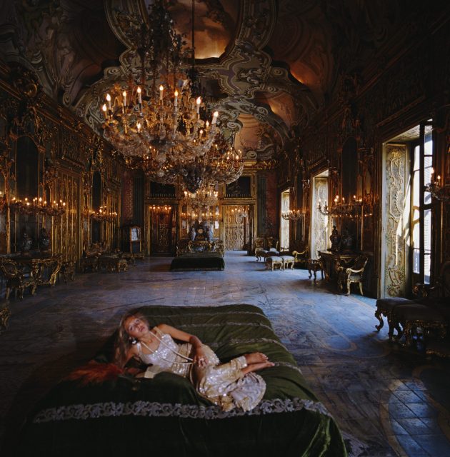 Donna Stefanella Vanni Calvello di San Vincenzo reclines in the Hall of Mirror