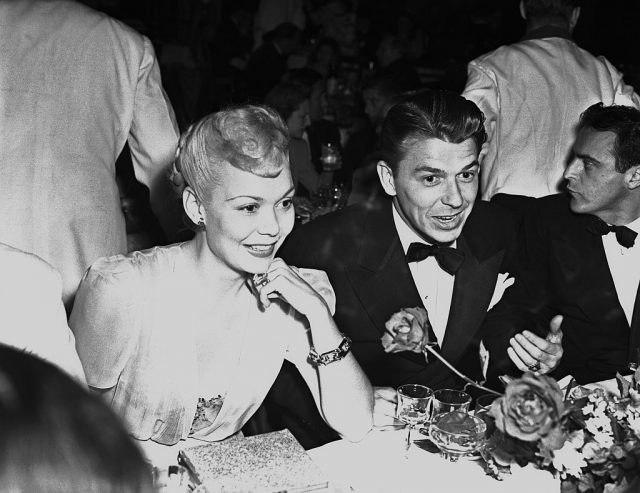 Jane Wyman and Ronald Reagan sitting at a table