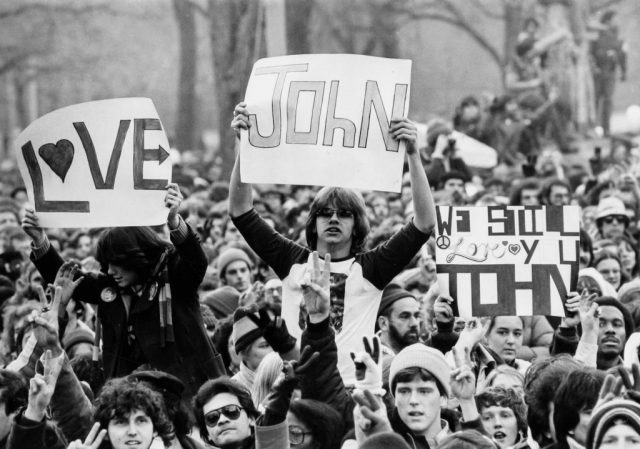 Group of John Lennon fans gathering to mourn his death