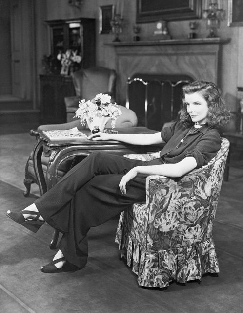 Katharine Hepburn sitting in a chair