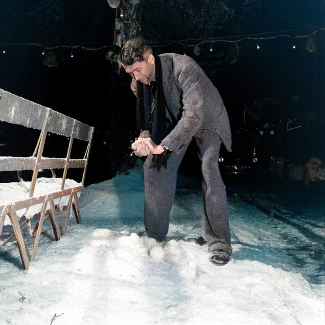 James Stewart making a snowball 