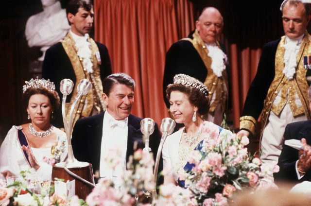 Queen Elizabeth and Ronald Reagan at a banquet 