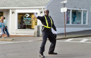 Shaq directing traffic in the middle of the street