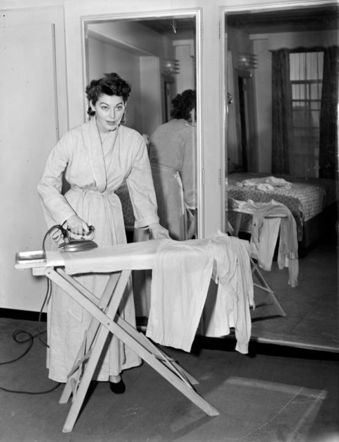 Ava Gardner ironing her pyjamas 