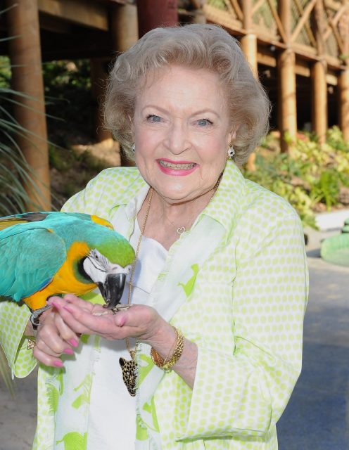 Betty White and a parrot 