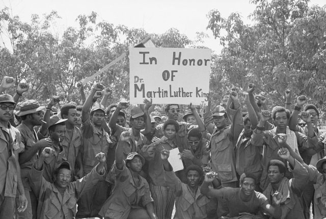 Black soldiers take part in the observance of the birthday of the late Martin Luther King Jr.