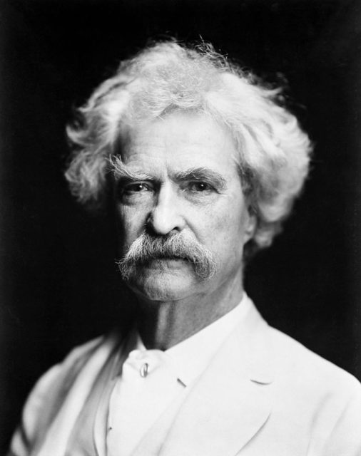 Mark Twain in a white shirt