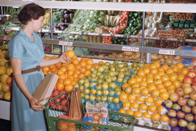 Woman selecting produce