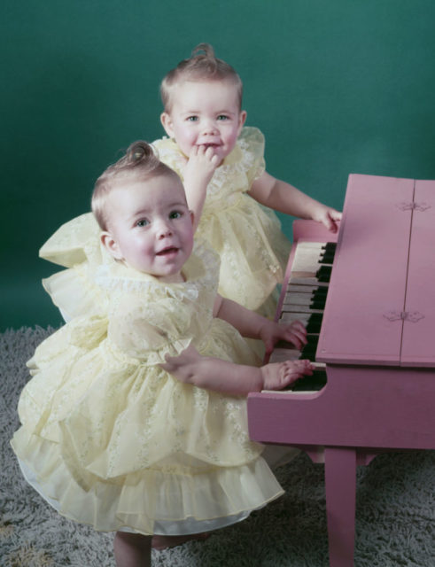 Twin girls dressed alike