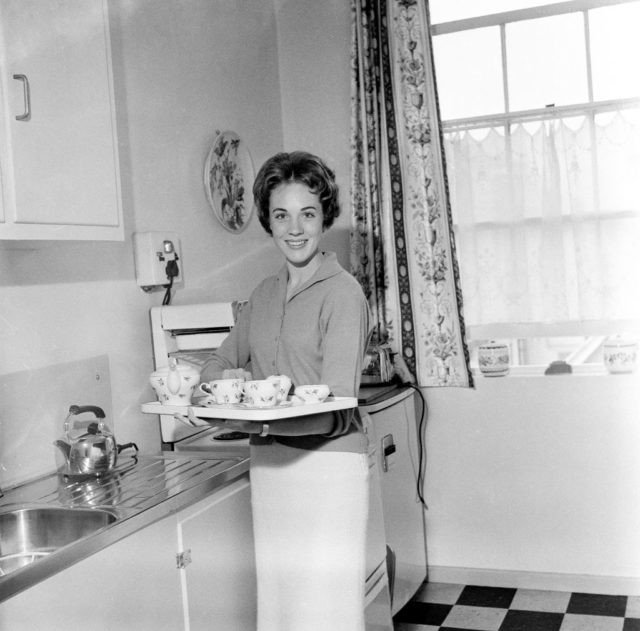 Julie Andrews preparing tea at home 