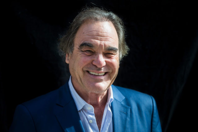 Oliver Stone smiling