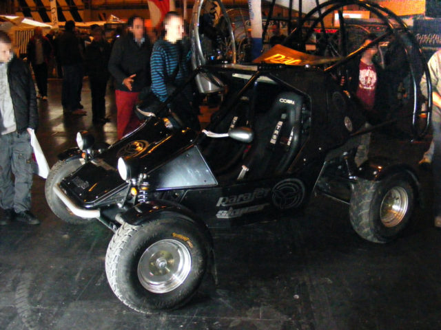 People standing around the Parajet Skycar