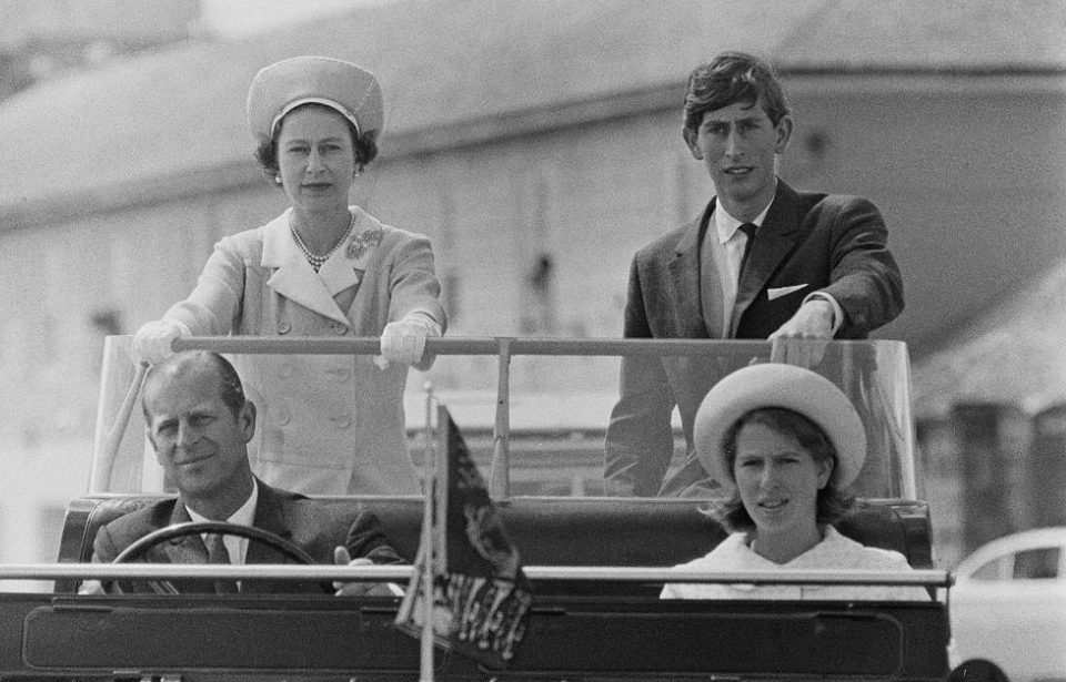 Queen Elizabeth II with Charles, Prince of Wales, Prince Philip, Duke of Edinburgh, and Anne, Princess Royal during a visit to the Isles of Scilly, 1967. (Photo by Terry Fincher/Express/Hulton Archive/Getty Images)