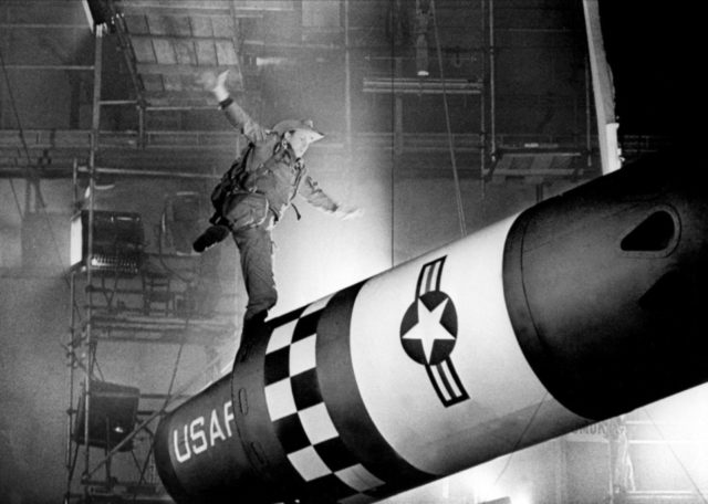 Slim Pickens walking on a nuclear bomb