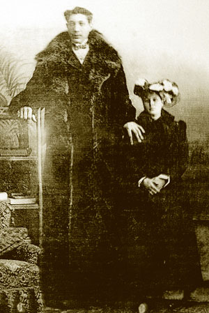 Feodor Machnow poses next to a woman
