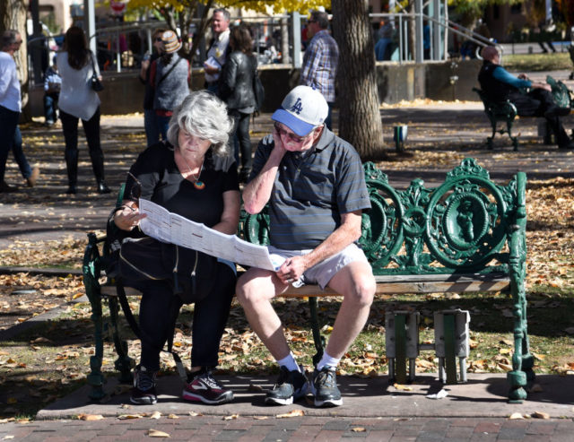 Two people looking over a map