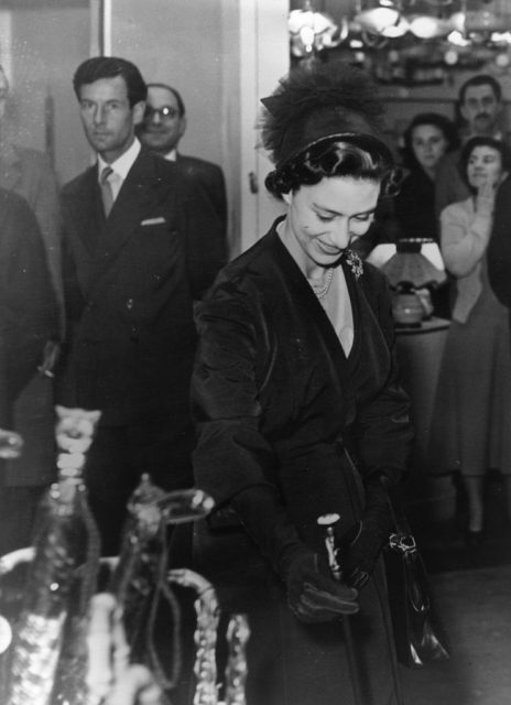 Princess Margaret at the British Industries Fair as Peter Townsend looks on