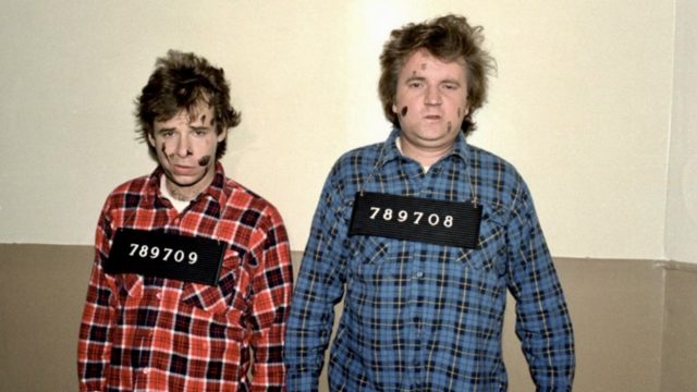 Bob and Doug Mackenzie standing for mugshots