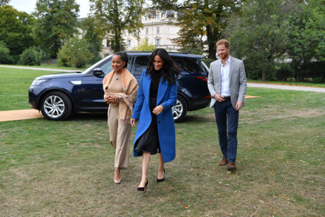 Meghan walking with her mother and Harry