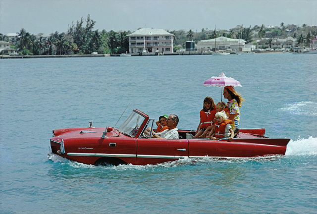 Kevin McClory takes his wife Bobo Sigrist in a car boat