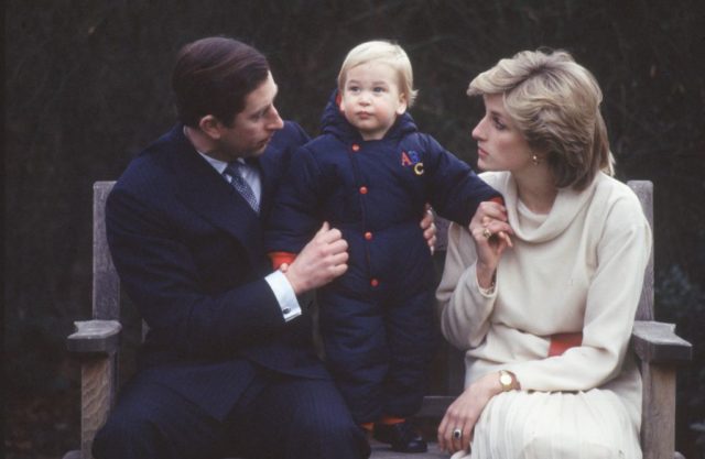 Prince Charles and Princess Diana hold baby William, 1983