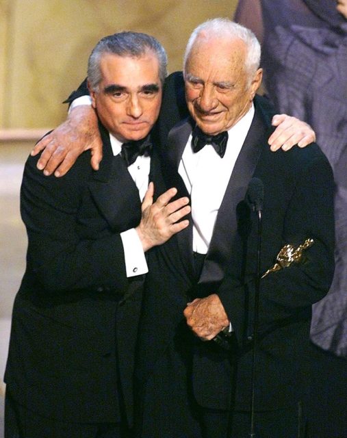 Elia Kazan hugs Martin Scorsese at the Academy Awards