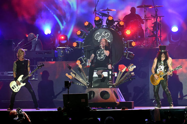 Duff McKagan, Axl Rose and Slash perform together