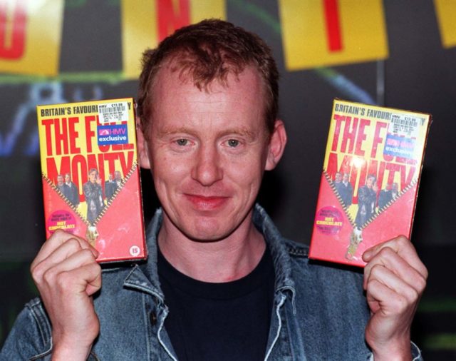 Steve Huison displaying DVDs