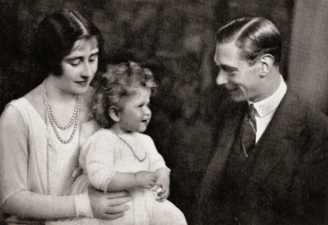 photo of Elizabeth II as a baby, with her parents the Duke and Duchess of York