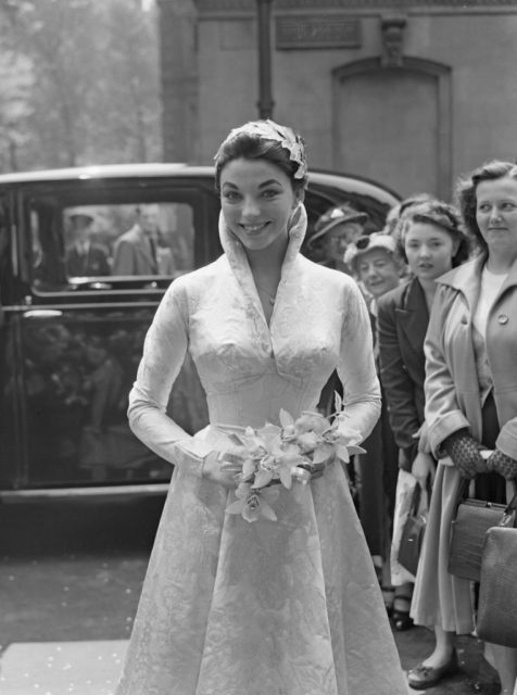 Joan Collins during her wedding to Maxwell Reed 