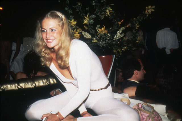 Partygoer sitting at Studio 54