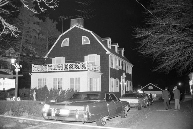 The exterior of the Amityville horror house after the killings of the DeFeo family.
