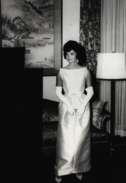 Jackie Kennedy at dinner in 1961, photo in black and white