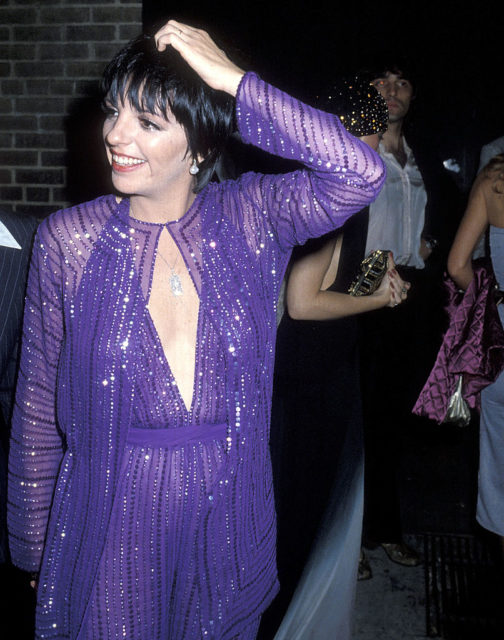 Liza Minnelli scratching her head