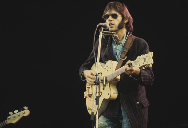 Neil Young in concert circa 1970